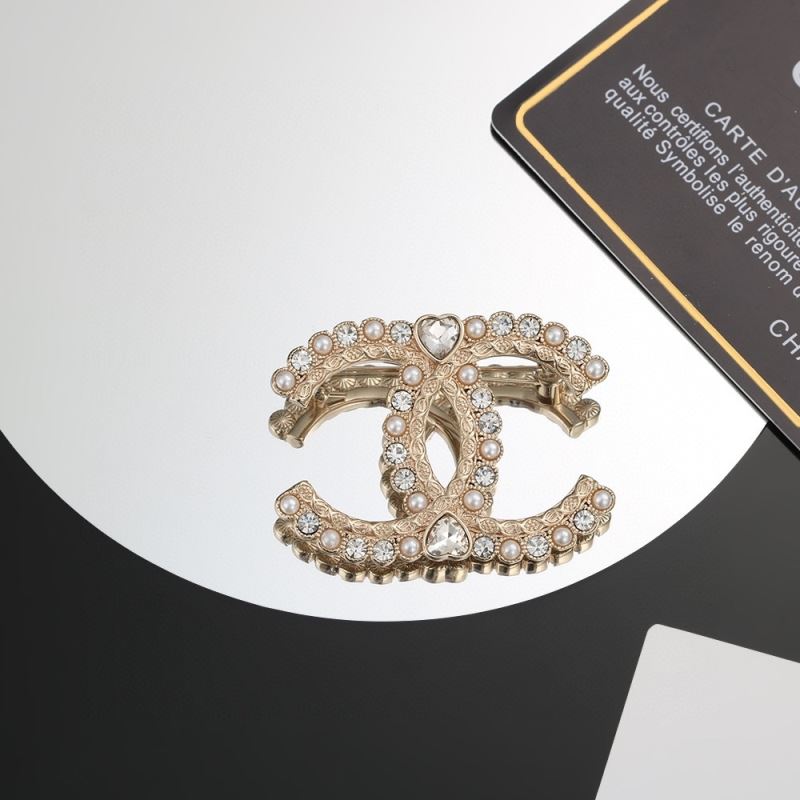 Ch**el brooches